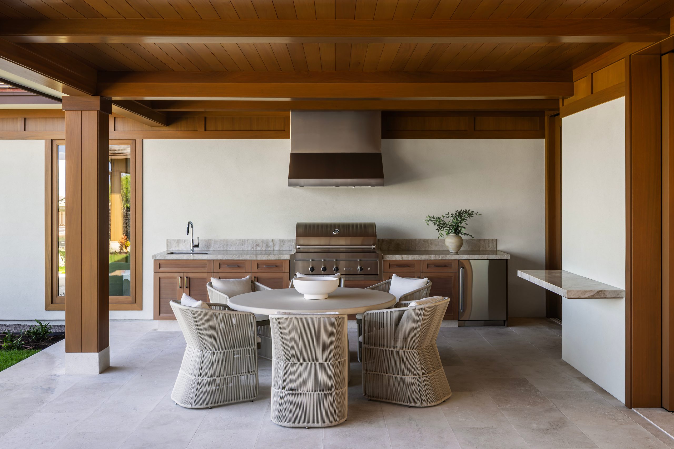 Adam Taylor outdoor kitchen — Wolf grill and Sub-Zero drawers